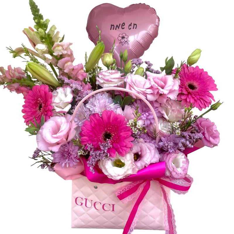 סידור פרחים ורוד בתיק אופנתי - חג שמח